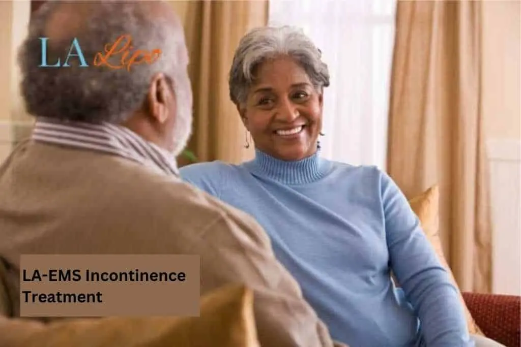 Couple sat smiling at each other - LA-EMS treatment Braintree