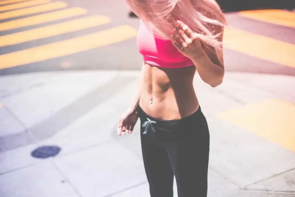 Woman with toned stomach after LA-EMS Body Sculpting Treatment Braintree